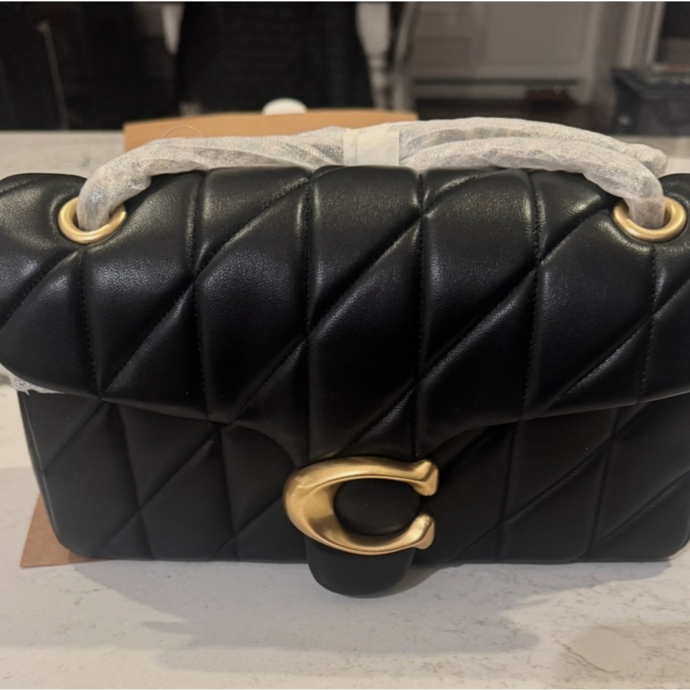 Black Quilted Leather Bag with Gold Accents